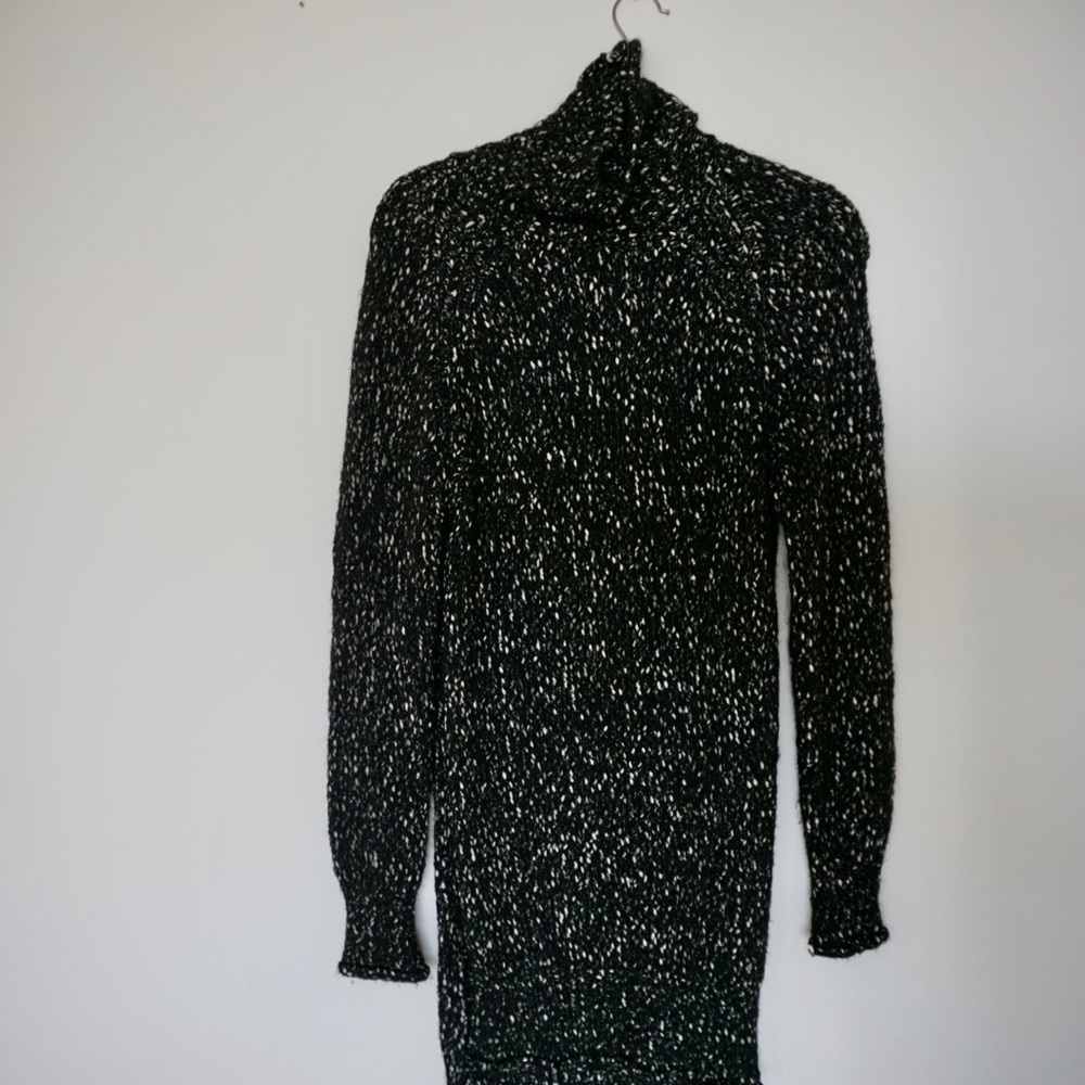 A long turtleneck sweater